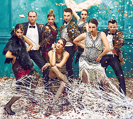 Image showing The studio shot of group of retro dancers