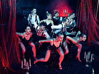 Image showing The studio shot of group of retro dancers