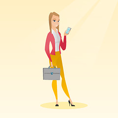 Image showing Caucasian business woman holding a mobile phone.