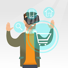 Image showing Man in virtual reality headset shopping online.