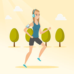 Image showing Young woman running with earphones and smartphone.