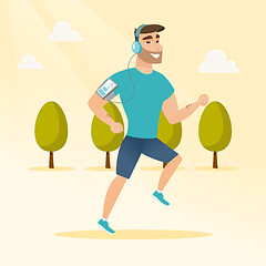 Image showing Young man running with earphones and smartphone.