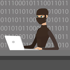 Image showing Hacker using laptop to steal information.