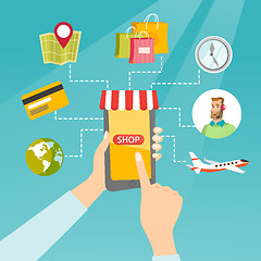 Image showing Hands holding phone connected with shopping icons.