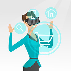 Image showing Woman in virtual reality headset shopping online.