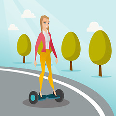 Image showing Woman riding on self-balancing electric scooter.