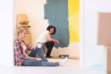 Image showing young couple doing home renovations