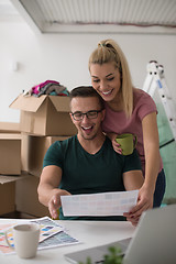 Image showing Young couple moving in a new home