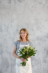 Image showing Photo of florist with bouquet