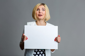 Image showing Photo of woman with paper