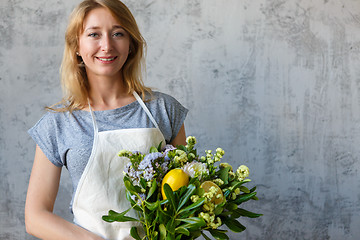 Image showing Portrait of florist with flowers