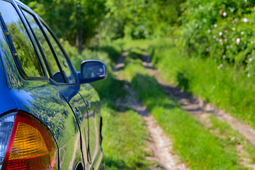 Image showing Blue car in forest