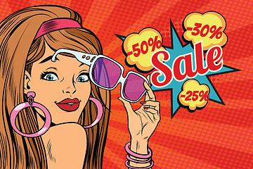 Image showing beautiful young woman in sunglasses, surprise sale