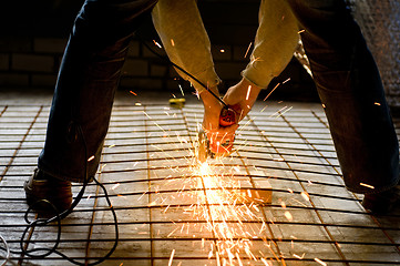 Image showing Construction worker with Angle Grinder