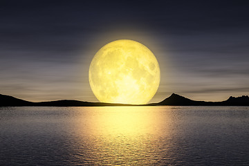 Image showing moon rising over the sey