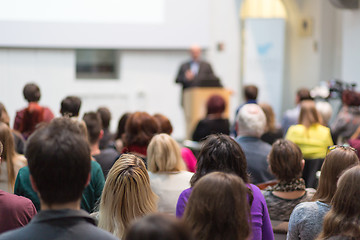 Image showing Man giving presentation in lecture hall at university.