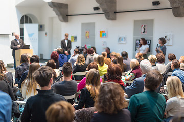 Image showing Man giving presentation in lecture hall at university.