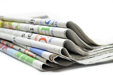 Image showing Newspapers folded and stacked