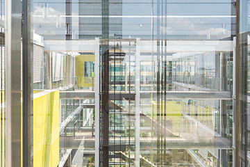 Image showing Abstract window reflections in morden office building.