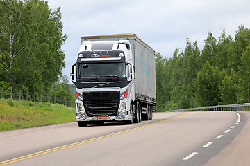 Image showing Colorful Volvo FH Cargo Transport along Highway