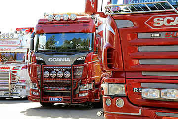 Image showing Row of Shiny Show Trucks 