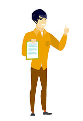 Image showing Businessman with clipboard giving thumb up.