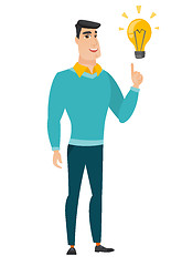 Image showing Businessman pointing at business idea light bulb.