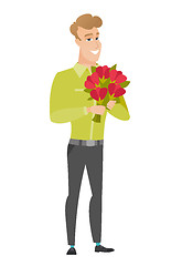 Image showing Caucasian businessman holding a bouquet of flowers