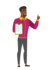 Image showing Businessman with clipboard giving thumb up.