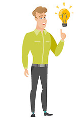 Image showing Businessman pointing at business idea light bulb.