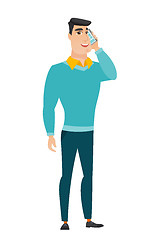 Image showing Businessman talking on a mobile phone.