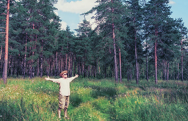 Image showing Man Raised Arms in Forest