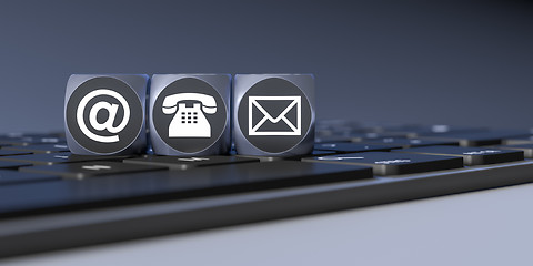 Image showing three cubes with signs for email phone and letter