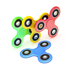 Image showing four fidget spinner in different colors