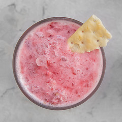 Image showing Strawberry smoothie with cookie