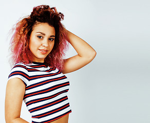 Image showing young happy smiling latin american teenage girl emotional posing on white background, lifestyle people concept