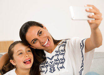 Image showing Mom and Daughter making a selfie