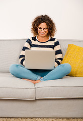 Image showing Beautiful woman working at home