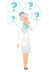 Image showing Thinking caucasian doctor with question marks.