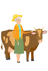 Image showing Senior farmer standing with crossed arms near cow.