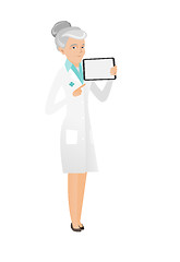 Image showing Senior caucasian doctor holding tablet computer.