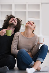 Image showing young couple in their new home