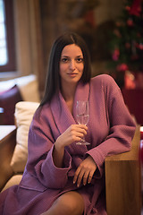 Image showing woman drinking champagne at spa