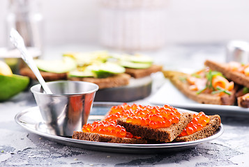 Image showing bread with red salmon caviar 