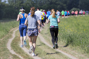 Image showing Group of young people on Outdoor cross-country running marathon