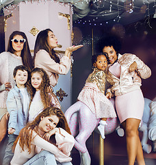 Image showing Lifestyle and people concept: young pretty diversity nations woman with different age children celebrating on birth day party together happy smiling, making selfie. African-american, asian and caucasi