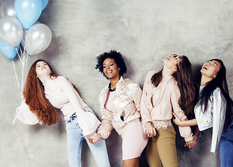 Image showing Lifestyle and people concept: young pretty diversity nations woman with different age children celebrating on birth day party together happy smiling, making selfie. African-american, asian and caucasi