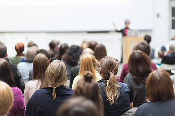 Image showing Woman giving presentation in lecture hall at university.