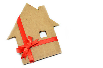 Image showing House from cardboard with ribbon