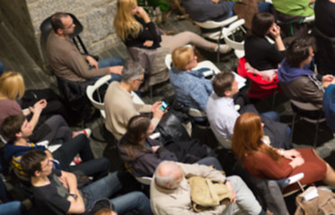 Image showing Blured audience in conference hall shot from abowe.